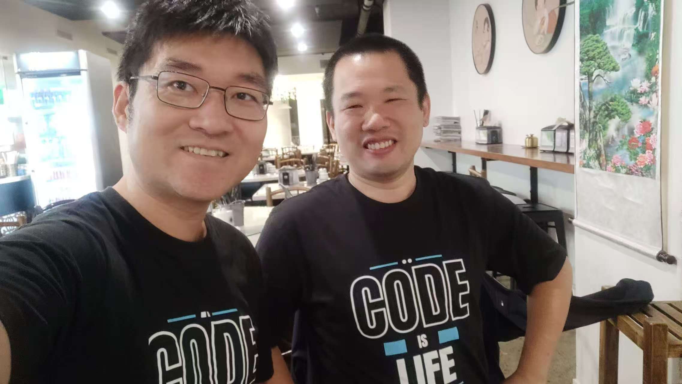 Matching &quot;Code is Life&quot; shirts indoors