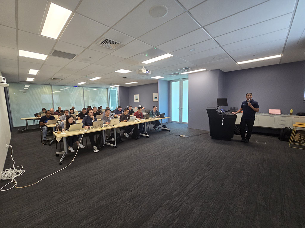 Participants engaged in AI workshop session.
