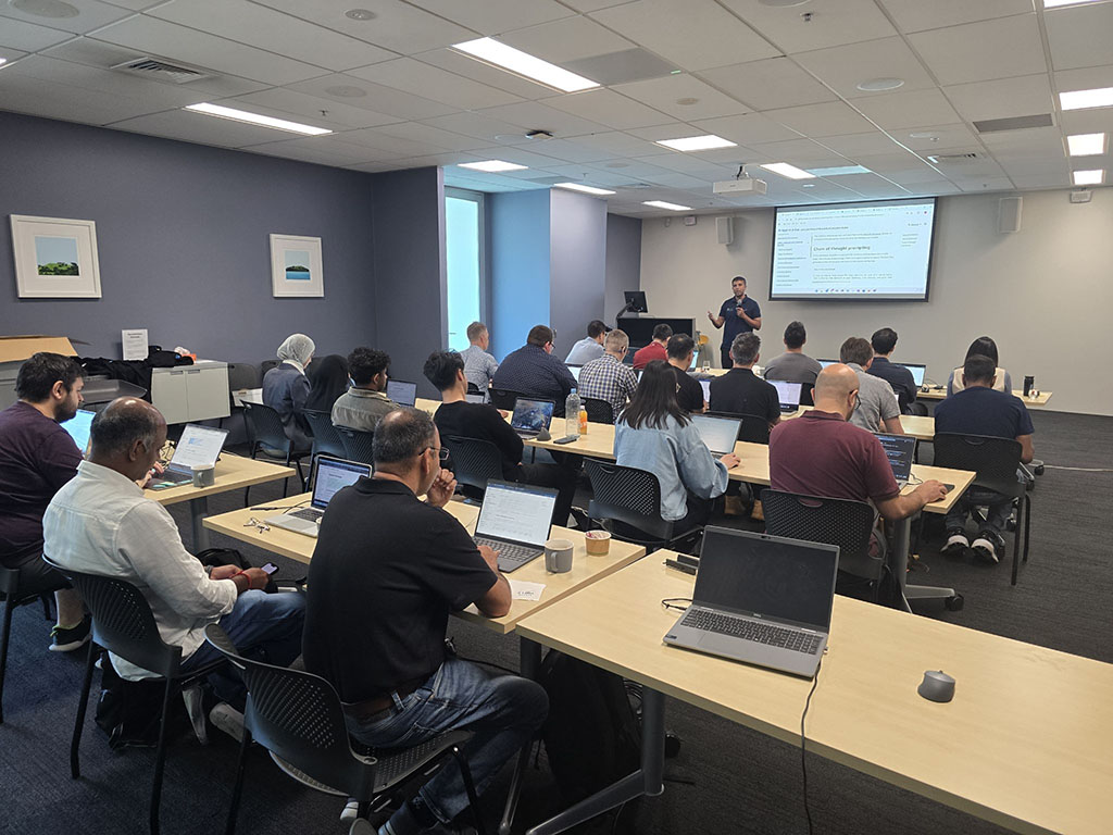Participants learning AI app development session